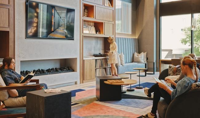 Gorgeous natural light in your living space a person standing in a very large room